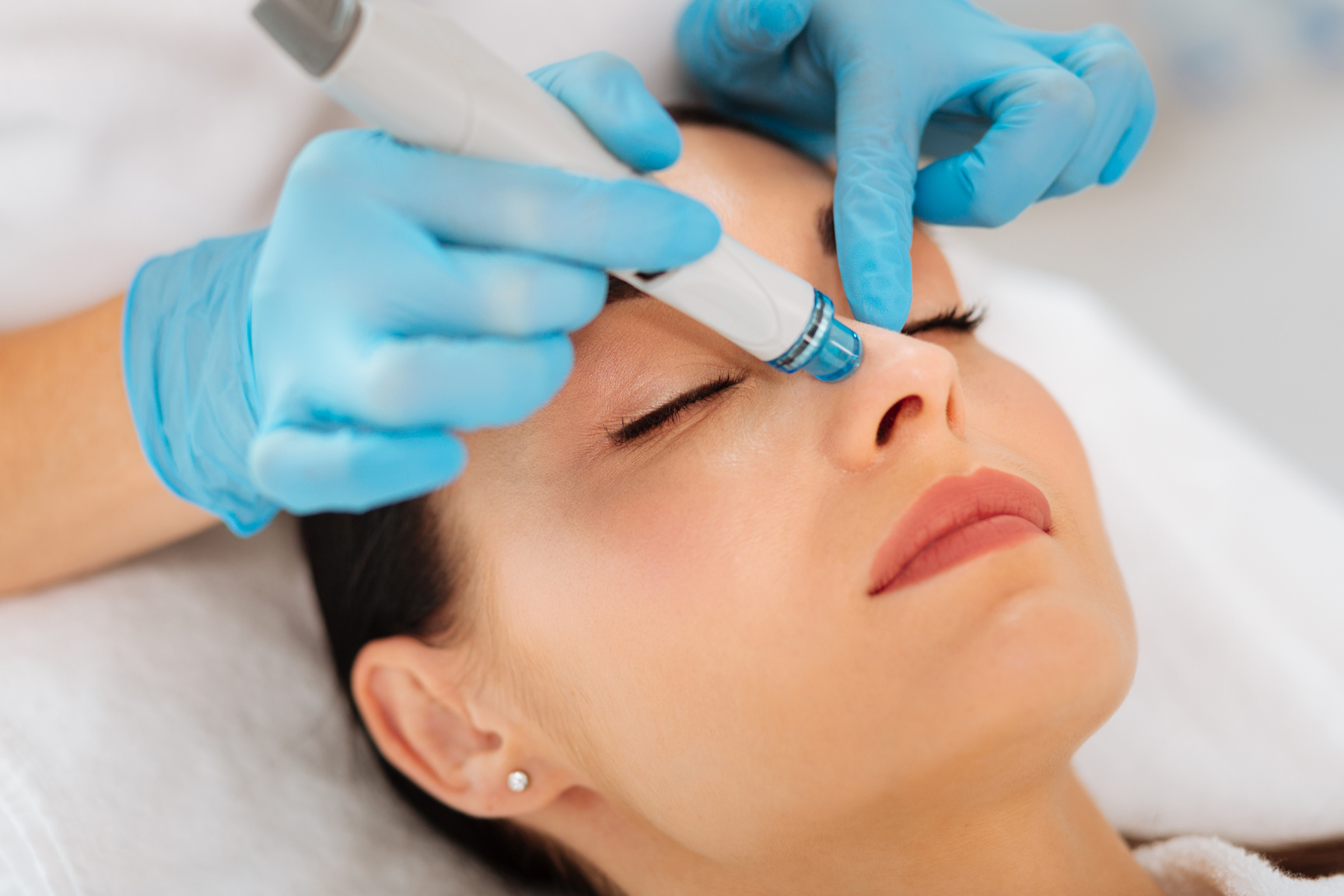 Face of a nice good looking woman during hydrafacial